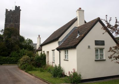 House in Luccombe beside the church